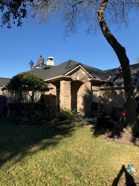 Reroofing a home in Cypress