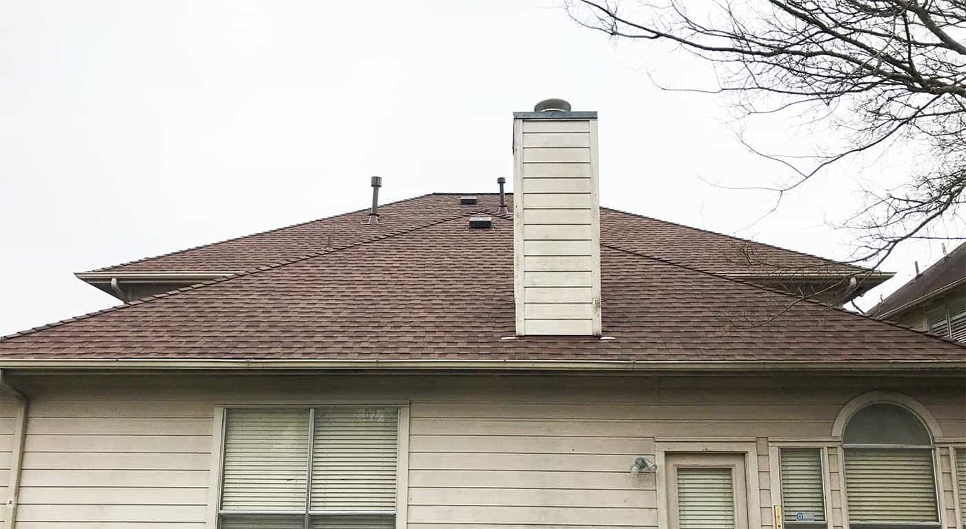 Reroofing a wind damages home in Houston