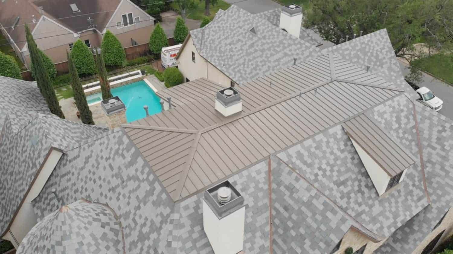 A slate tile re-roof project in Houston, Texas