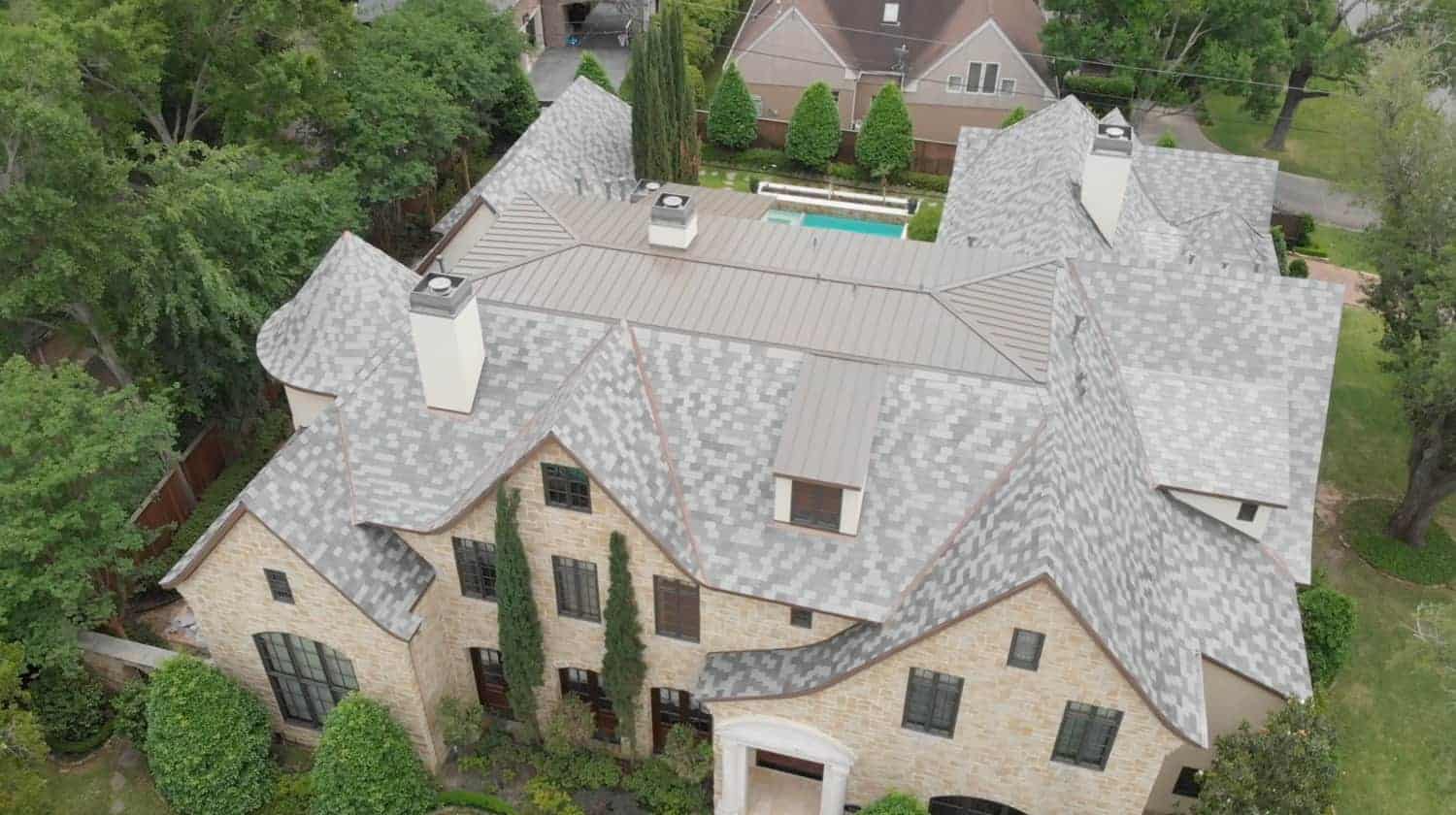 A slate tile re-roof project in Houston, Texas